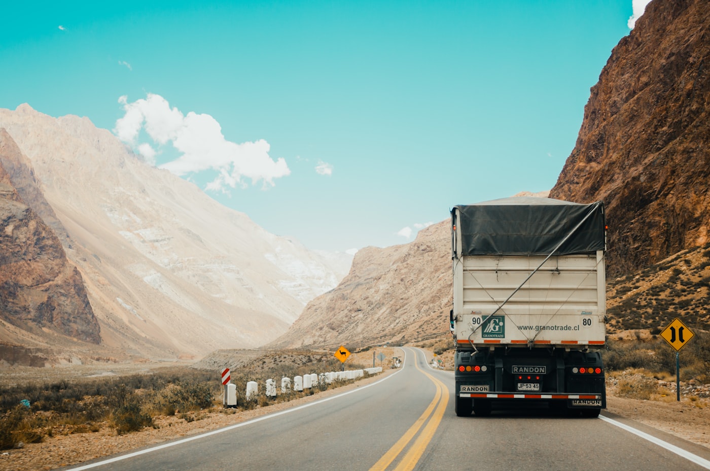 Loaded vehicle delivering goods on the highway